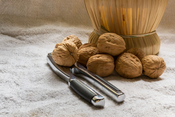 Set with some walnuts and a nutcracker
