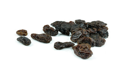 Dried raisins on a white background