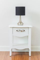 Lamp on bedside table