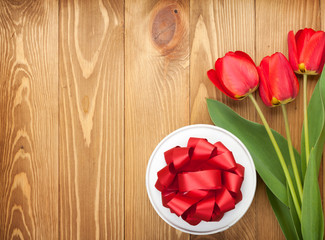 Fresh tulips and gift box