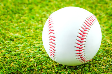 Baseball on green grass