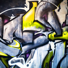 Abstract modern colorful graffiti fragment on concrete wall