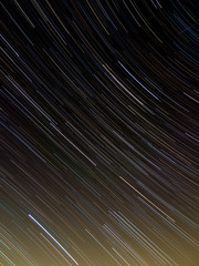 Textile pattern of star trails in the night sky