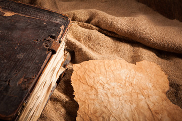 part of old book and part of old paper on sackcloth