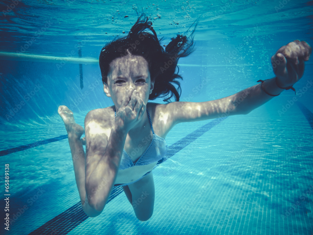 Canvas Prints teenager diving into a pool