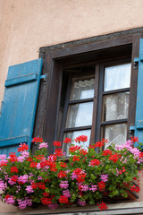 Fototapeta na wymiar Window of a house in Eguisheim, Alsace, France