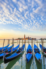 Fototapeta na wymiar San Giorgio Maggiore church and gondolas in Venice