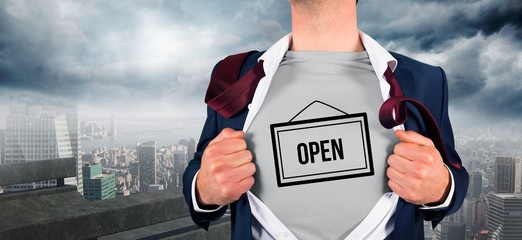 Composite image of businessman opening shirt in superhero style © WavebreakmediaMicro