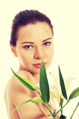 Beautiful woman with white lily.