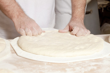 Baker Working with Dough.
