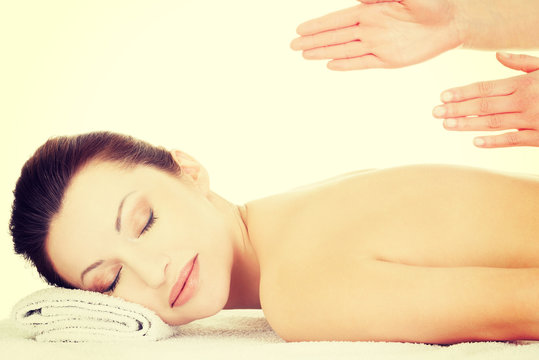 Preaty woman relaxing beeing massaged in spa