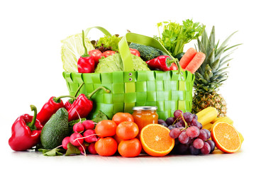 Green shopping bag with groceries isolated on white