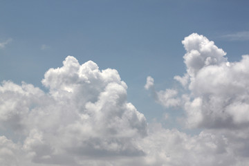 Naklejka na ściany i meble white clouds on blue sky.