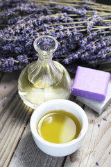 Obraz na płótnie Canvas Mix of lavender flowers and cosmetic