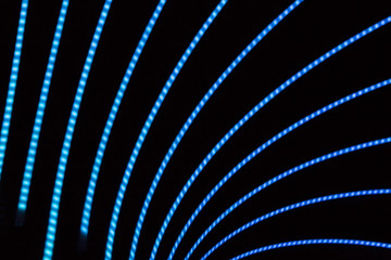 Neon abstract background of lines and bokeh