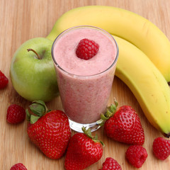 Raspberry smoothie with strawberries, green apples and bananas - 65899345