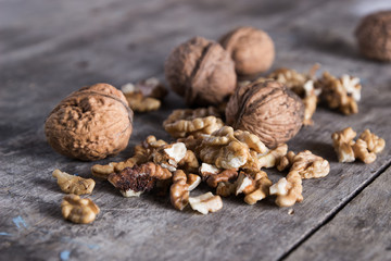 walnuts on rustic wooden texture