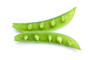 opened pod of sweet peas on white background