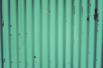 Green color of  corrugated iron wall