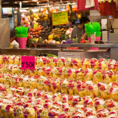 glasses with different fruits on the market