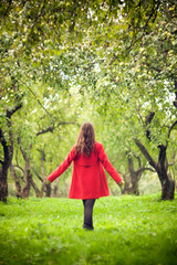 woman walking on the grass