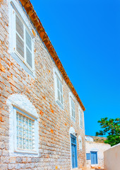 Beautiful old stone made building in Hydra island in Greece