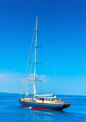 beautiful sailing yacht in the port of Hydra island in Greece