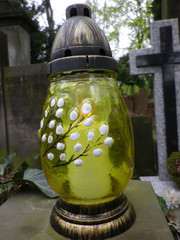 Easter grave candle on historic cemetery