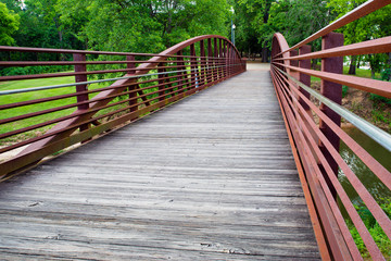 Walking bridge in park on riverfront in Columbus, Georgia