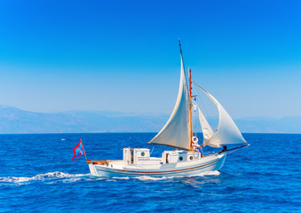 Old wooden Greek boat (Kaiki) in Spetses island in Greece