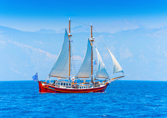 Fototapeta na wymiar Classic wooden Greek boat (Perama) in Spetses island in Greece