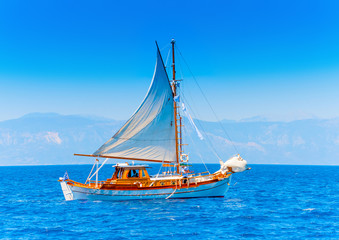 Fototapeta na wymiar Old wooden Greek boat (Kaiki) in Spetses island in Greece