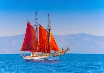 Foto auf Acrylglas Segeln Old classic wooden sailing boat in Spetses island in Greece