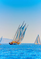 several classic wooden sailing boats in Spetses island in Greece