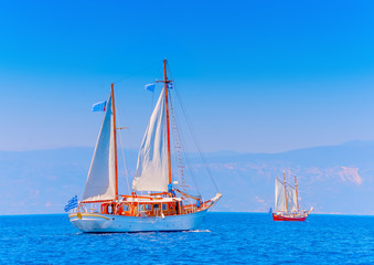 2 Old classic wooden sailing boats in Spetses island in Greece