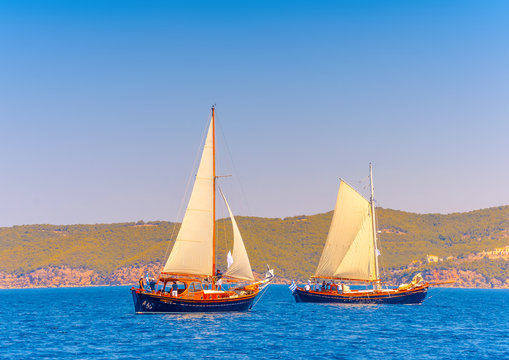 2 Old classic wooden sailing boats in Spetses island in Greece