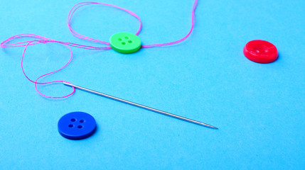 Needle thread and buttons