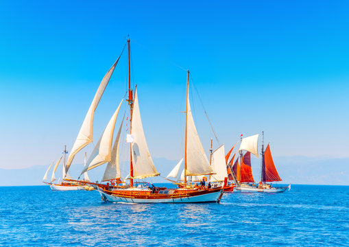 several classic wooden sailing boats in Spetses island in Greece