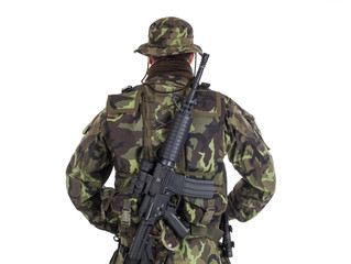 Obraz premium Soldier in camouflage and modern weapon M4.
