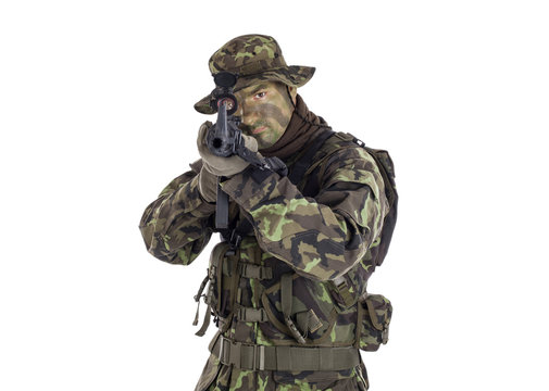 Soldier in camouflage and modern weapon M4.