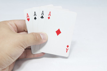 Man hands holding cards.