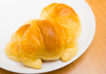 croissants on a white plate
