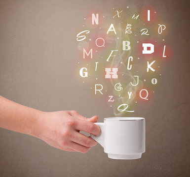 Coffee cup with colorful letters