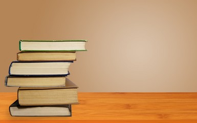 Books on wood shelf