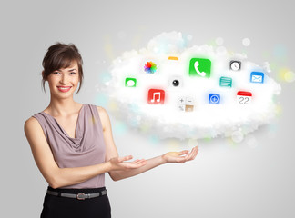 Young woman presenting cloud with colorful app icons and symbols