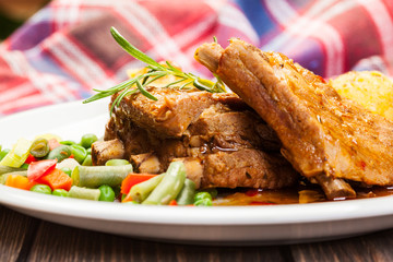 Pork spareribs served with mashed potatoes