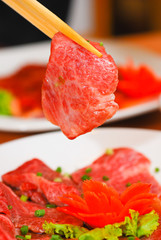 Korean food Beef Sliced holding with chopstick