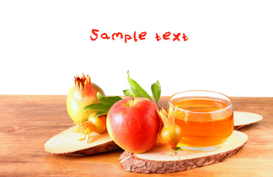 rosh hashanah concept - apple honey and pomegranate