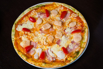 Appetizing pizza with seafood