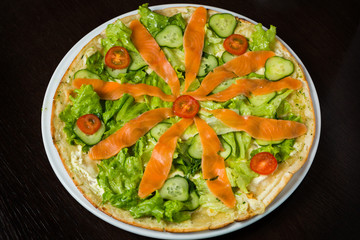 Appetizing pizza with seafood